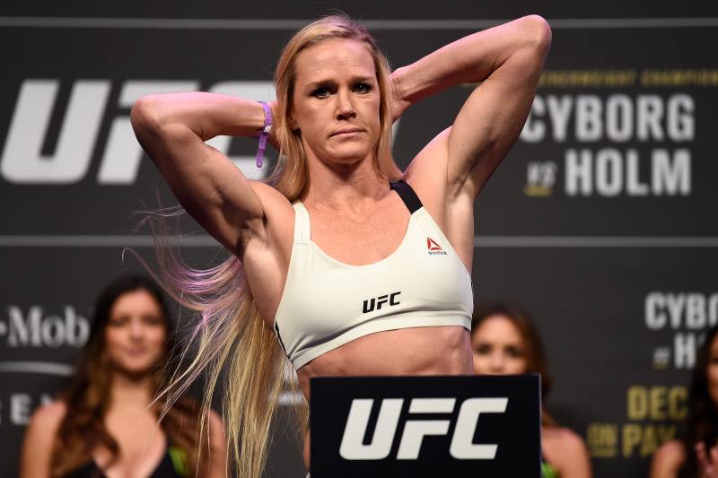 LAS VEGAS, NV - DECEMBER 29: Holly Holm poses on the scale during the UFC 219 weigh-in inside T-Mobile Arena on December 29, 2017 in Las Vegas, Nevada. (Photo by Jeff Bottari/Zuffa LLC/Zuffa LLC via Getty Images)