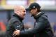 BURNLEY, ENGLAND - AUGUST 20: Manager of Liverpool Jurgen Klopp and Sean Dyche, Manager of Burnley embrace ahead of kick off during the Premier League match between Burnley and Liverpool at Turf Moor on August 20, 2016 in Burnley, England. (Photo by Jan