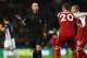 WEST BROMWICH, ENGLAND - DECEMBER 31: Shkodran Mustafi (C) and Jack Wilshere (R) of Arsenal protest to Referee Mike Dean during the Premier League match between West Bromwich Albion and Arsenal at The Hawthorns on December 31, 2017 in West Bromwich, Engla