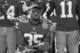 Kneeling: Eric Reid