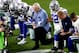 Cowboys owner Jerry Jones (center)