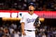 LOS ANGELES, CA - NOVEMBER 01: Yu Darvish #21 of the Los Angeles Dodgers walks to the dugout after being relieved during the second inning against the Houston Astros in game seven of the 2017 World Series at Dodger Stadium on November 1, 2017 in Los Ange