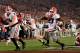 PASADENA, CA - JANUARY 01: Running back Nick Chubb #27 of the Georgia Bulldogs scores on a two-yard touchdown run late in the fourth quarter against the Oklahoma Sooners in the 2018 College Football Playoff Semifinal at the Rose Bowl Game presented by No