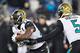 NASHVILLE, TN - DECEMBER 31: Blake Bortles #5 hands off the ball to Leonard Fournette #27 of the Jacksonville Jaguars during a game against the Tennessee Titans at Nissan Stadium on December 31, 2017 in Nashville, Tennessee. The Titans defeated the Jagu