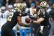 NEW ORLEANS, LA - JANUARY 07: Drew Brees #9 of the New Orleans Saints hands the ball of to Mark Ingram #22 of the New Orleans Saints during the second half of the NFC Wild Card playoff game against the Carolina Panthers at the Mercedes-Benz Superdome on
