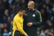 MANCHESTER, ENGLAND - DECEMBER 18: Alexis Sanchez of Arsenal (L) and Josep Guardiola, Manager of Manchester City (R) embrace after the final whistle during the Premier League match between Manchester City and Arsenal at the Etihad Stadium on December 18,
