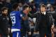 Chelsea's Belgian striker Michy Batshuayi (L) greets Chelsea's Italian head coach Antonio Conte after a UEFA Champions League Group C football match between Chelsea and Atletico Madrid at Stamford Bridge in London on December 5, 2017. / AFP PHOTO / Glyn K
