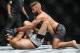 Jeremy Stephens (top) pounds Gilbert Melendez.