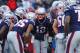 FOXBORO, MA - DECEMBER 31: Tom Brady #12 of the New England Patriots huddles with teammates during the second half against the New York Jets at Gillette Stadium on December 31, 2017 in Foxboro, Massachusetts. (Photo by Maddie Meyer/Getty Images)