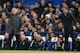 Manchester United's Portuguese manager Jose Mourinho (L) and Chelsea's Italian head coach Antonio Conte gesture on the touchline during the English Premier League football match between Chelsea and Manchester United at Stamford Bridge in London on Novembe