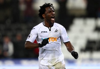 SWANSEA, WALES - JANUARY 17:  Wilfried Bony of Swansea City celebartes after he scores his sides second goal during The Emirates FA Cup Third Round Replay between Swansea City and Wolverhampton Wanderers at Liberty Stadium on January 17, 2018 in Swansea, 