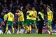 LONDON, ENGLAND - JANUARY 17: Norwich City celebrate after Jamal Lewis of Norwich City scores his sides first goal during The Emirates FA Cup Third Round Replay between Chelsea and Norwich City at Stamford Bridge on January 17, 2018 in London, England.