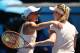 MELBOURNE, AUSTRALIA - JANUARY 19: Marta Kostyuk (L) of Ukraine congratulates Elina Svitolina of Ukraine after Svitolina won their third round match on day five of the 2018 Australian Open at Melbourne Park on January 19, 2018 in Melbourne, Australia. (