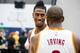 CLEVELAND, OH - SEPTEMBER 26: Iman Shumpert #4 talks with Kyrie Irving #2 of the Cleveland Cavaliers during media day at Cleveland Clinic Courts on September 26, 2016 in Cleveland, Ohio. NOTE TO USER: User expressly acknowledges and agrees that, by downlo