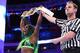 Naomi celebrates winning the SmackDown Women's Championship at WrestleMania 33.