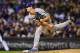 DENVER, CO - SEPTEMBER 29: Walker Buehler #64 of the Los Angeles Dodgers pitches against the Colorado Rockies in the third inning of a game at Coors Field on September 29, 2017 in Denver, Colorado. (Photo by Dustin Bradford/Getty Images)