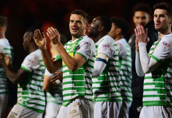 YEOVIL, ENGLAND - JANUARY 06: The Yeovil Town side celebrate victory at the final whistle during The Emirates FA Cup Third Round match between Yeovil Town and Bradford City at Huish Park on January 6, 2018 in Yeovil, England. (Photo by Harry Trump/Getty I