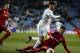 MADRID, SPAIN - JANUARY 10: Marco Asensio of Real Madrid and a player of Numancia battle for the ball during the Spanish Copa del Rey match between Real Madrid and Numancia at Santiago Bernabeu on January 10, 2018 in Madrid, Spain. (Photo by TF-Images/TF-