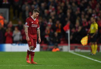 Liverpool's Spanish defender Alberto Moreno leaves the field with an injury during the UEFA Champions League Group E football match between Liverpool and Spartak Moscow at Anfield in Liverpool, north-west England on December 6, 2017. / AFP PHOTO / Paul EL