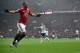 Manchester United's French striker Anthony Martial celebrates after scoring the opening goal of the English Premier League football match between Manchester United and Tottenham Hotspur at Old Trafford in Manchester, north west England, on October 28, 201