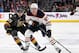 LAS VEGAS, NV - JANUARY 13: Connor McDavid #97 of the Edmonton Oilers skates with the puck against William Karlsson #71 of the Vegas Golden Knights in the first period of their game at T-Mobile Arena on January 13, 2018 in Las Vegas, Nevada. The Oilers w