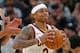 Isaiah Thomas' struggle to find a rhythm in Cleveland and his close ties to owner Dan Gilbert have made it difficult to gain the trust of his teammates.