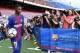 Barcelona's new player Ousmane Dembele (L) enters the pitch at the Camp Nou stadium in Barcelona, during his official presentation by the Catalan football club, on August 28, 2017.
French starlet Ousmane Dembele agreed a five-year deal with Barcelona wort
