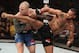 BELEM, BRAZIL - FEBRUARY 03: (R-L) Thiago Santos of Brazil kicks Anthony Smith in their middleweight bout during the UFC Fight Night event at Mangueirinho Arena on February 03, 2018 in Belem, Brazil. (Photo by Buda Mendes/Zuffa LLC/Zuffa LLC via Getty Im