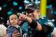 MINNEAPOLIS, MN - FEBRUARY 04: Nick Foles #9 of the Philadelphia Eagles celebrates with his daughter Lily Foles after his 41-33 victory over the New England Patriots in Super Bowl LII at U.S. Bank Stadium on February 4, 2018 in Minneapolis, Minnesota. Th