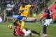Juventus's defender from Brazil Alex Sandro (C) fights for the ball with Bologna's defender Ibrahima Mbaye from Senegal (L) and Bologna's forward Orji Okwonkwo from Nigeria during the Italian Serie A football match Bologna vs Juventus on December 17, 2017