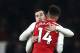 LONDON, ENGLAND - FEBRUARY 03: Henrikh Mkhitaryan of Arsenal and Pierre-Emerick Aubameyang of Arsenal celebrate victory together after the Premier League match between Arsenal and Everton at Emirates Stadium on February 3, 2018 in London, England. (Photo