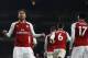 Arsenal's Gabonese striker Pierre-Emerick Aubameyang celebrates with teammates scoring the team's fourth goal during the English Premier League football match between Arsenal and Everton at the Emirates Stadium in London on February 3, 2018. / AFP PHOTO