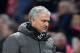 Manchester United's Portuguese manager Jose Mourinho leaves the pitch at the end of the English Premier League football match between Manchester United and Huddersfield Town at Old Trafford in Manchester, north west England, on February 3, 2018. / AFP PHO