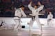 The North and South Korean taekwondo teams entertained the crowd before the opening ceremonies began in Pyeongchang Friday.
