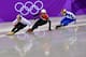 South Korea's Lim Hyojun (L), Netherlands' Sjinkie Knegt (C) and Russia's Semen Elistratov take part in the men's 1,500m short track speed skating A final event during the Pyeongchang 2018 Winter Olympic Games, at the Gangneung Ice Arena in Gangneung on F
