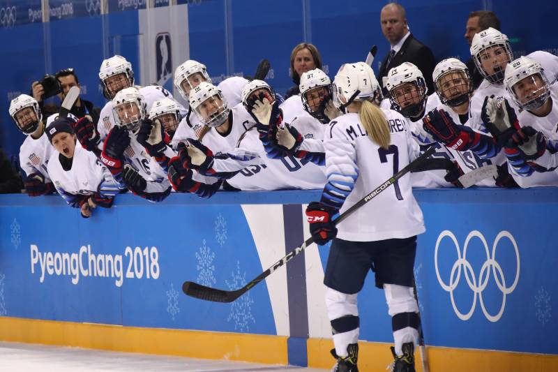 GANGNEUNG, SOUTH KOREA - FEBRUARY 11:  Monique Lamoureux-Morando #7 of the United States celebrates with teammates after scoring a goal in the second period against Finland during the Women's Ice Hockey Preliminary Round - Group A game on day two of the P