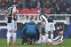 TURIN, ITALY - FEBRUARY 18: Gonzalo Higuain of Juventus lies injured during the Serie A match between Torino FC and Juventus at Stadio Olimpico di Torino on February 18, 2018 in Turin, Italy. (Photo by Valerio Pennicino/Getty Images)