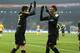 Lewandowski celebrates with Pierre-Emerick Aubameyang.
