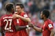 (L-R) Bayern Munich's Austrian defender David Alaba, Bayern Munich's Polish striker Robert Lewandowski and Bayern Munich's Brazilian midfielder Douglas Costa celebrate after the third goal during the German first division football Bundesliga match between