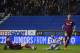 Wigan Athletic's English-born Northern Irish striker Will Grigg (C) scores his team's first goal during the English FA Cup fifth round football match between Wigan Athletic and Manchester City at the DW Stadium in Wigan, northwest England, on February 19,