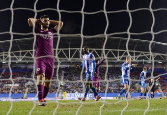 WIGAN, ENGLAND - FEBRUARY 19:  Sergio Aguero of Manchester City looks dejected during the Emirates FA Cup Fifth Round match between Wigan Athletic and Manchester City at DW Stadium on February 19, 2018 in Wigan, England.  (Photo by Gareth Copley/Getty Ima