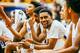 Jovan Blackshear, center, cracks a smile.