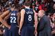 PORTLAND, OR - JANUARY 24: Tom Thibodeau talks to Nemanja Bjelica #8 and Andrew Wiggins #22 of the Minnesota Timberwolves on January 24, 2018 at the Moda Center Arena in Portland, Oregon. NOTE TO USER: User expressly acknowledges and agrees that, by down