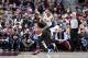 LeBron James driving on Otto Porter Jr.