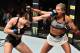 Mackenzie Dern lands a left hand on Ashley Yoder at UFC 222.
