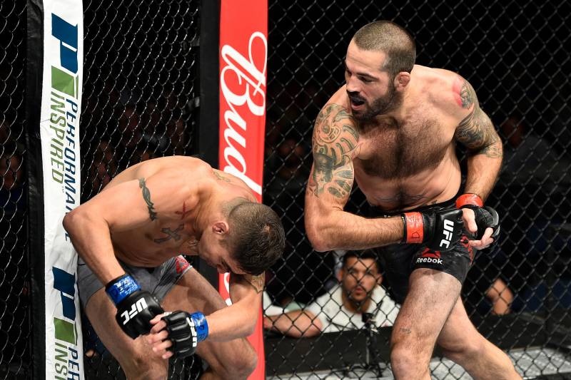 NORFOLK, VA - NOVEMBER 11: (R-L) Matt Brown throws an elbow against Diego Sanchez in their welterweight bout during the UFC Fight Night event inside the Ted Constant Convention Center on November 11, 2017 in Norfolk, Virginia. (Photo by Brandon Magnus/Zu
