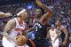 TORONTO, ON - FEBRUARY 8: Michael Beasley #8 of the New York Knicks is guarded closely by OG Anunoby #3 of the Toronto Raptors in an NBA game at the Air Canada Centre on February 8, 2018 in Toronto, Ontario, Canada. The Raptors defeated the Knicks 113-88