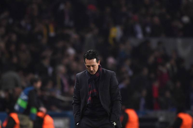 Paris Saint-Germain's Spanish headcoach Unai Emery reacts after losing the UEFA Champions League round of 16 second leg football match between Paris Saint-Germain (PSG) and Real Madrid on March 6, 2018, at the Parc des Princes stadium in Paris. / AFP PHO