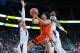 LAS VEGAS, NV - MARCH 07: Stephen Thompson Jr. #1 of the Oregon State Beavers handles the ball against Dominic Green #22 and Noah Dickerson #15 of the Washington Huskies during a first-round game of the Pac-12 basketball tournament at T-Mobile Arena on Ma