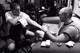 Coach Eric Turner wraps Olivia Parker's hands before an MMA fight.